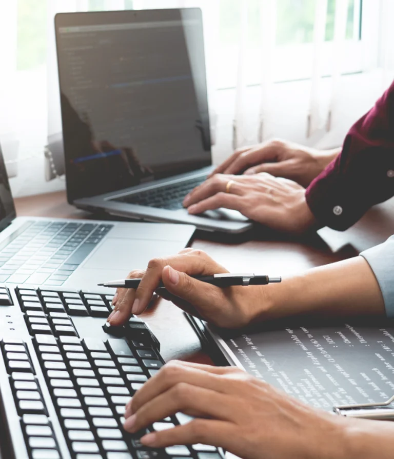 People at computers providing support