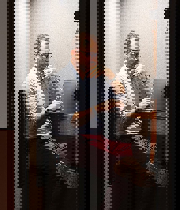 Man working on computer at office