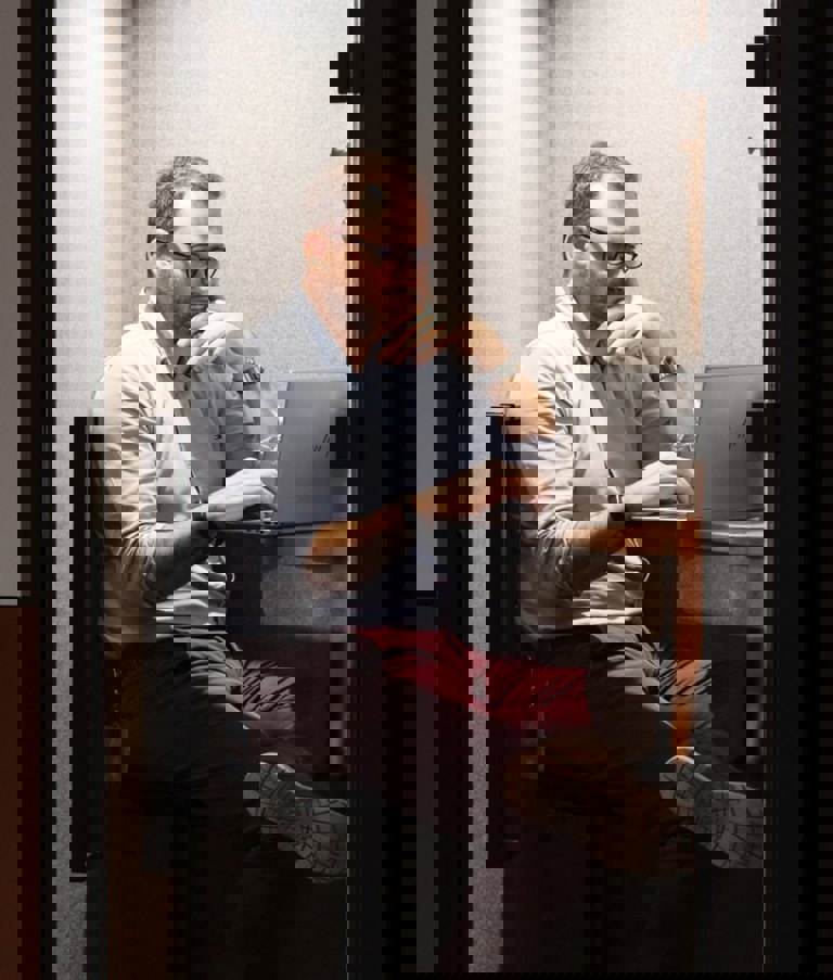 Man working on computer at office