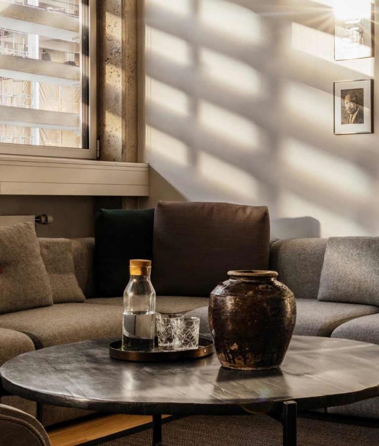 Grey sofas in a meeting room in 7N's Aarhus office in Denmark. 