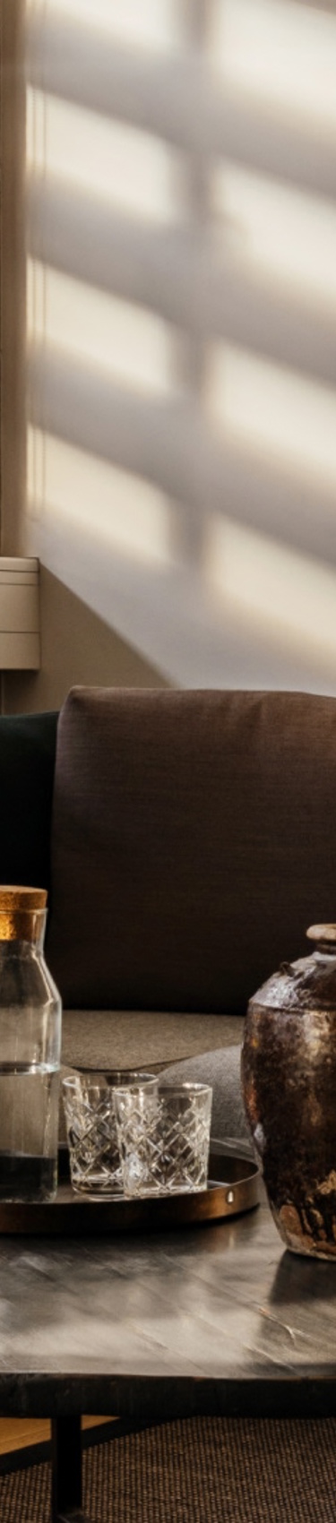 Grey sofas in a meeting room in 7N's Aarhus office