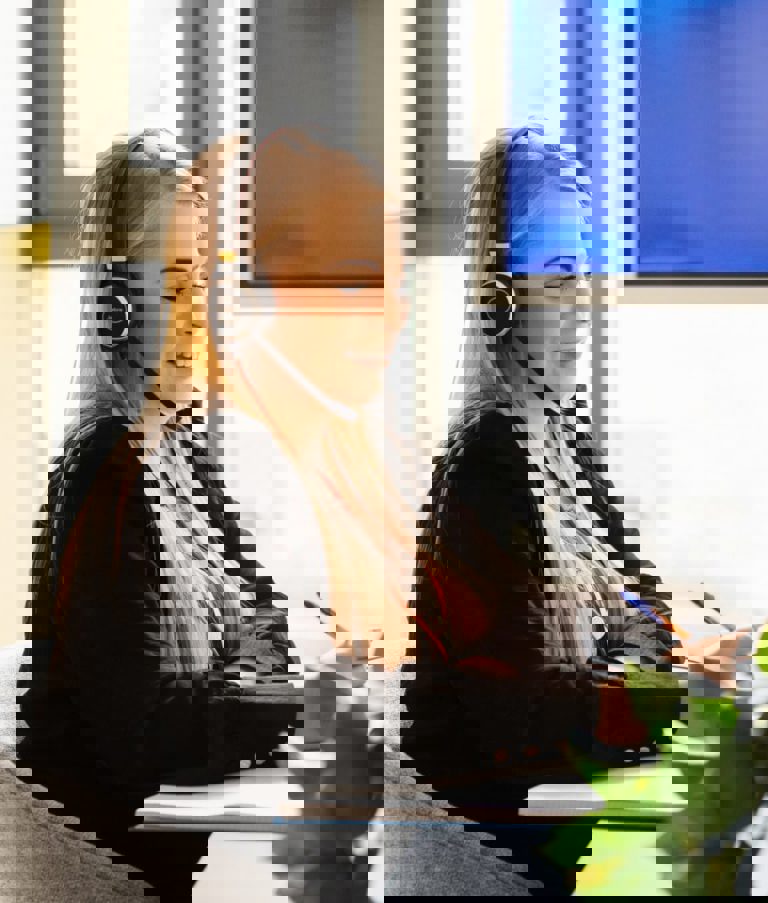 Woman talking through headphones