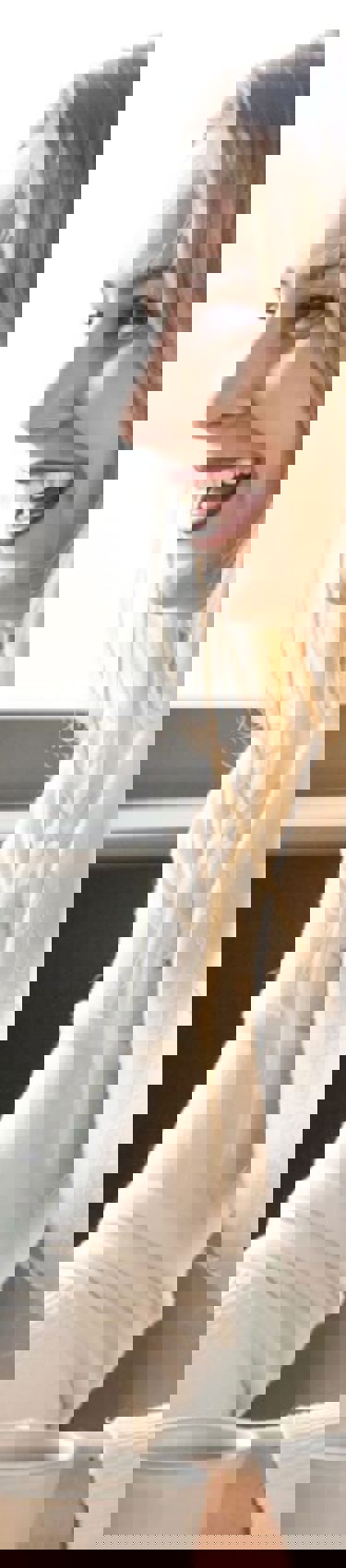 Man and woman at table laughing